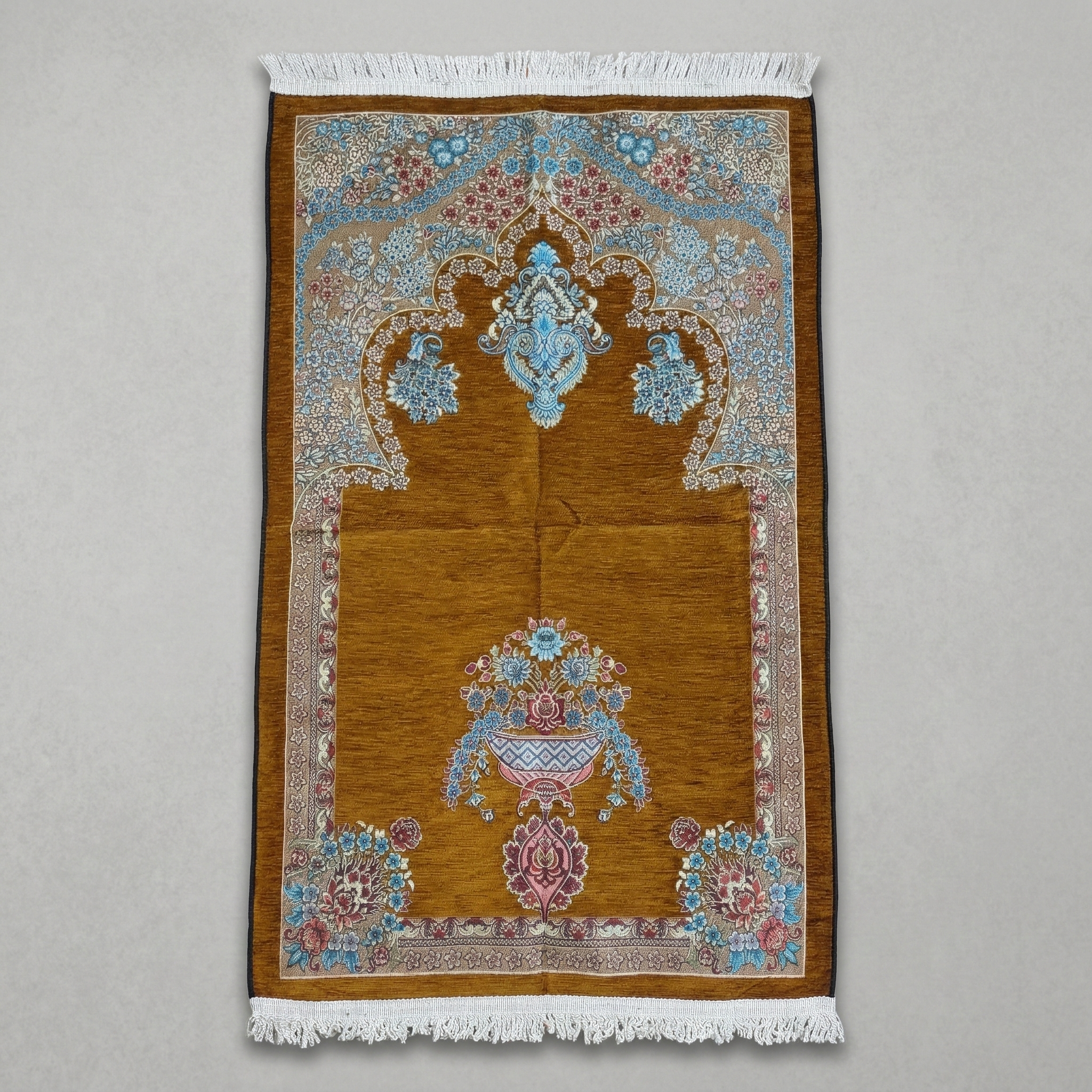 Decorative rug with intricate patterns on a plain background